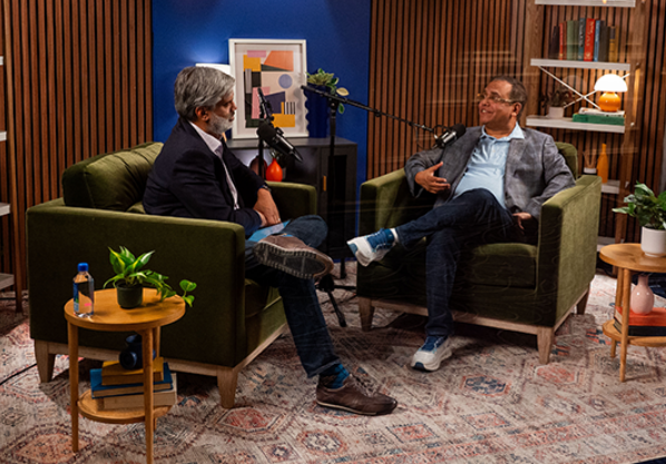 Two men talking to each other on the Executive Insight Podcast